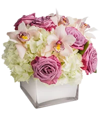 Composizione di rose, ortensie e orchidee